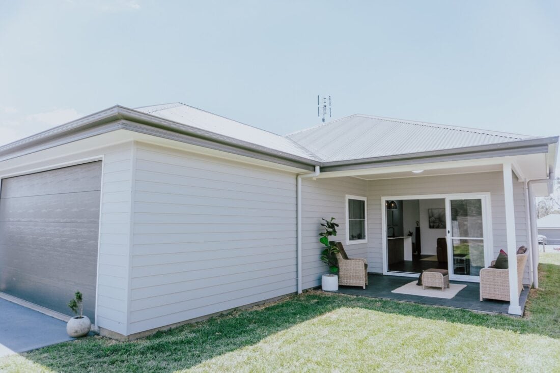 Modern white family home with outdoor patio, perfect for Australian lifestyles.