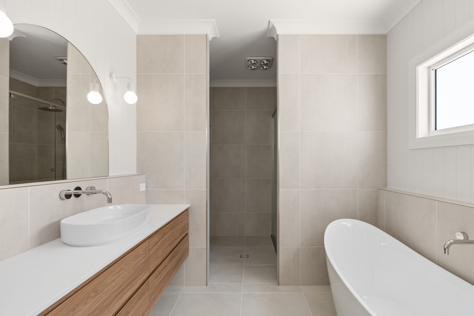 HIA Awards Finalist: Seasgair House, Paul and Bec’s Vision 3 Ensuite with freestanding bath, timber vanity and arched mirror